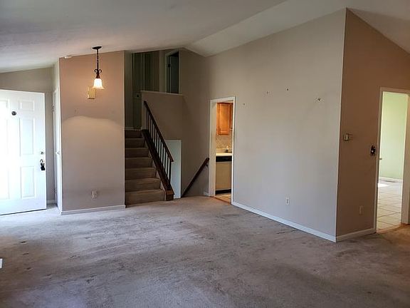 living room/ stairs to upper level