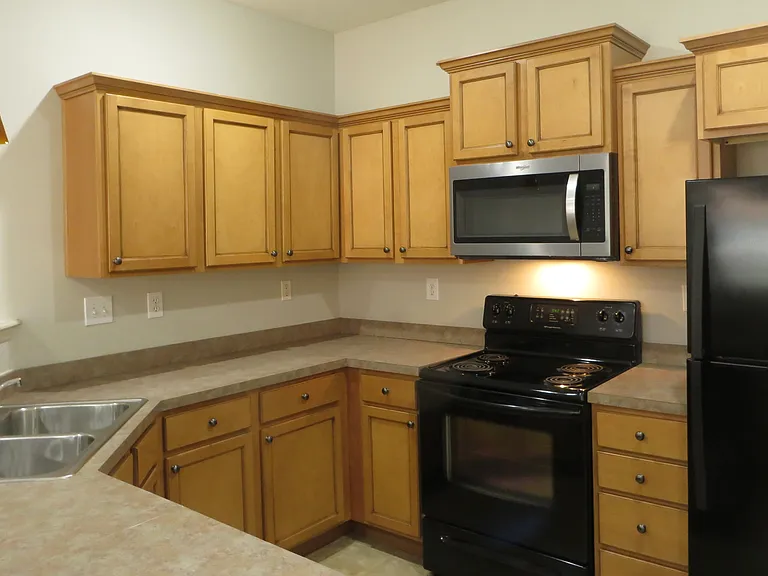 Includes range, microwave, dishwasher, refrigerator with icemaker.