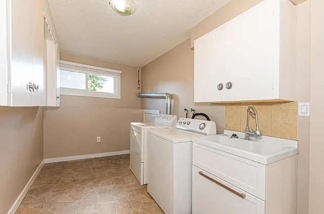 153 Woodvale Road West NW — Photo 30
