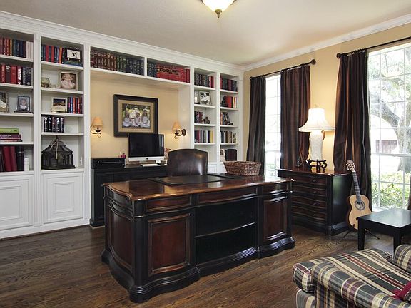 Study with beautiful built-ins and trim. Built-in desk added in between bookshelves ('06).