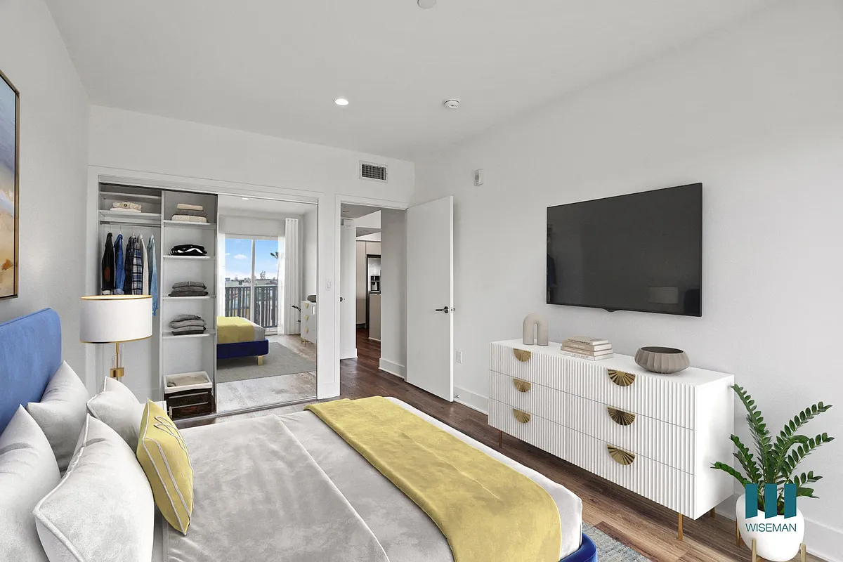 Bedroom with Mirrored Closet with Shelving - Westgate Wonder by Wiseman