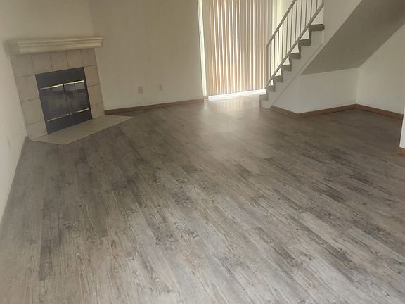 from hallway into living room/dining room and kitchen