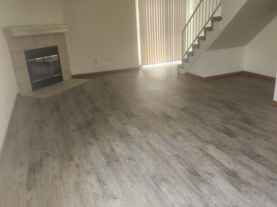 from hallway into living room/dining room and kitchen