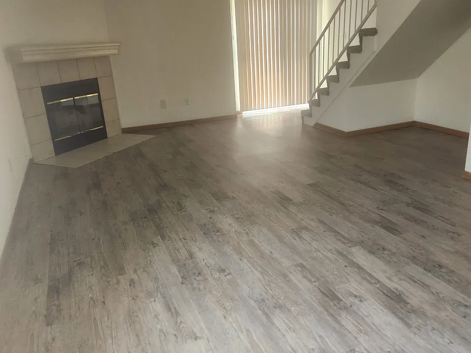 from hallway into living room/dining room and kitchen