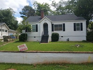 Parking pad to right of home