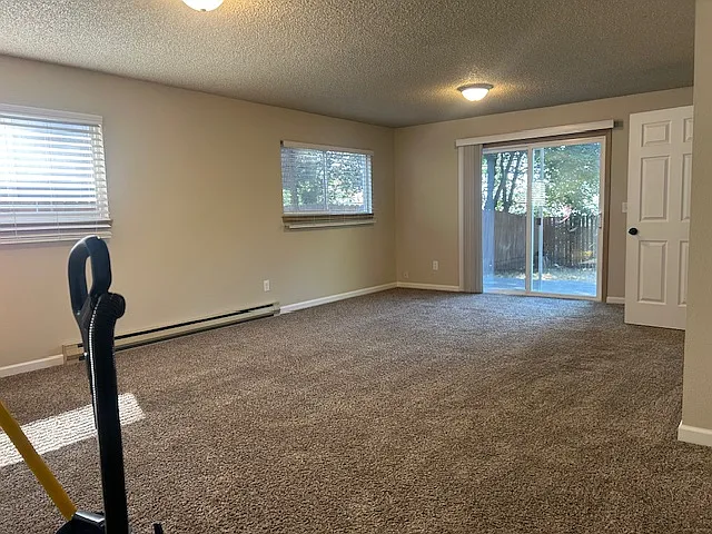 Downstairs 21 X 14 bonus room opens to rear yard