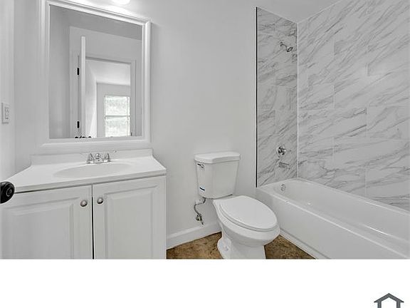 Updated bathroom with modern fixtures and a bright, clean finish.