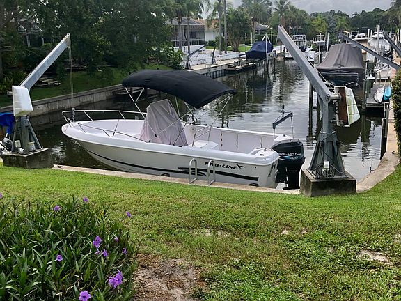 5000# davits will take 26-28 ft vessel