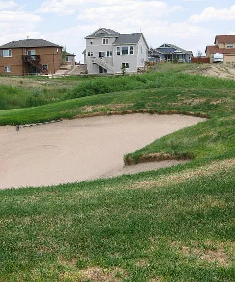 View of the home from the sand traps.