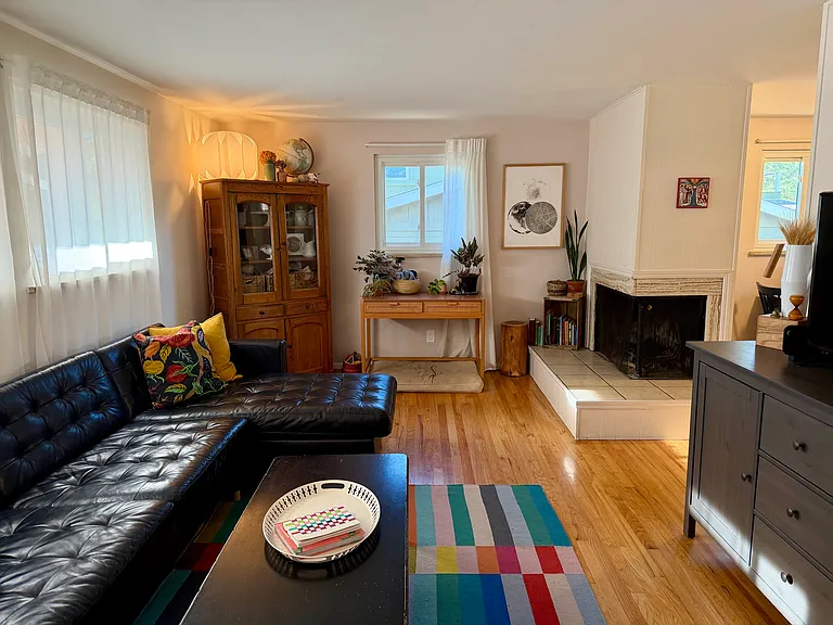 Living Room with Wood-Burning Fireplace