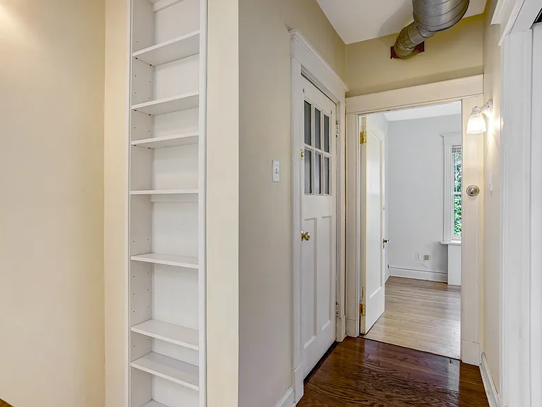 Top of stairs and bookshelf
