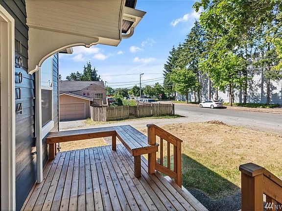 Idyllic front porch on quiet street.