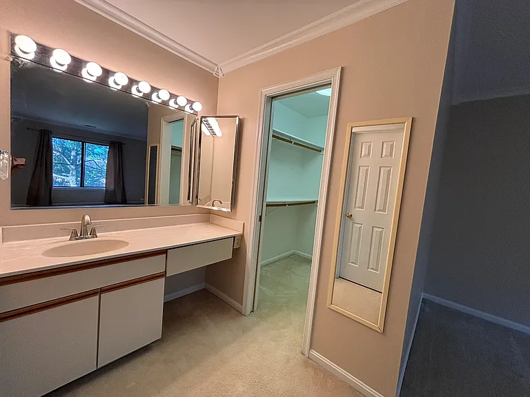 Primary Bedroom en-suite bathroom and walk in closet