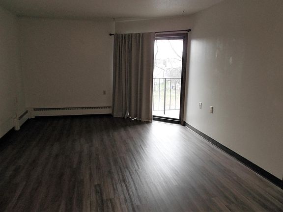 Living Room with patio door to balcony on second floor, or to patio on first floor