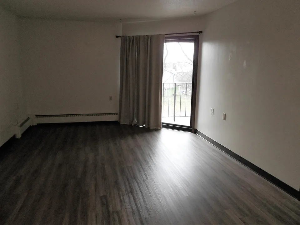 Living Room with patio door to balcony on second floor, or to patio on first floor