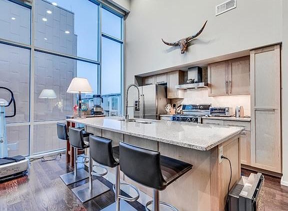 Modern chef's kitchen complete with high-end stainless Bosch appliances.