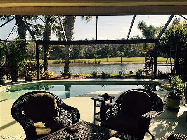solar heated pool overlooking 16th fairway and lake with man made beach!