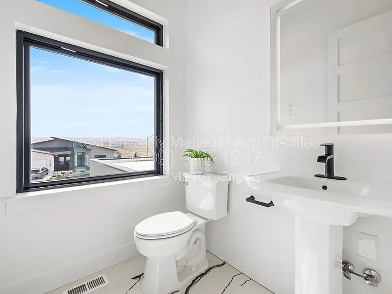 6982 W 22nd Ave — Photo 40