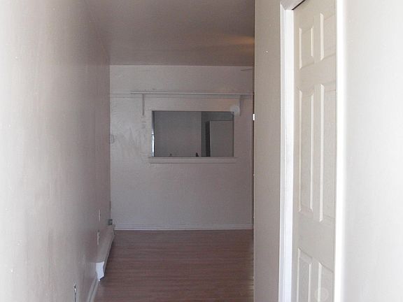 As you walk into the front door the bedroom door is on the right