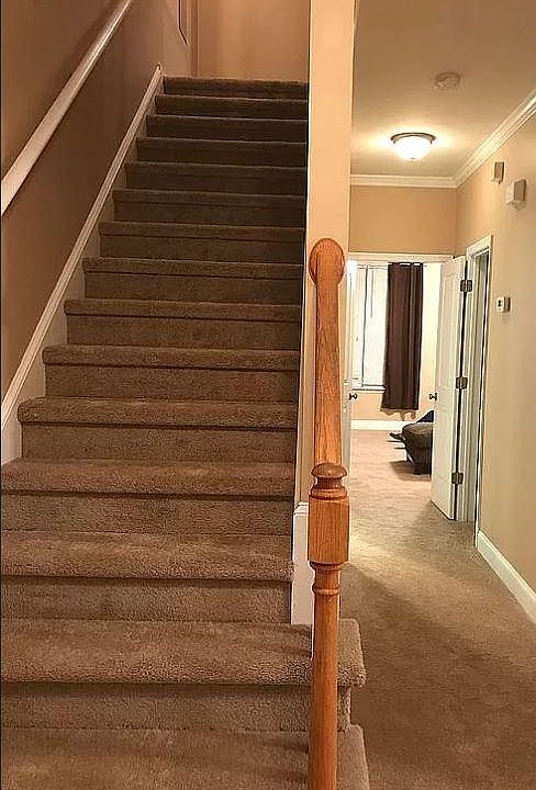 Stairwell and hallway before painting