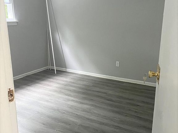 Second bedroom freshly painted woth new flooring