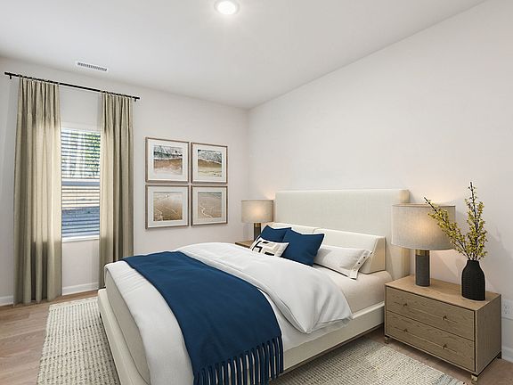 Secondary bedroom in the Johnson floorplan at a Meritage Homes community in Garner, NC.