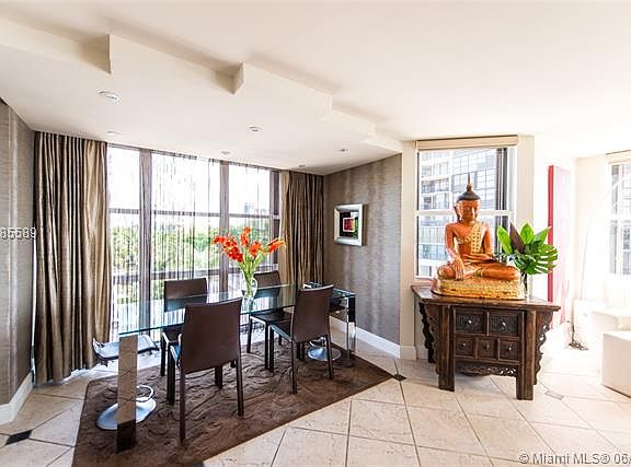 Light filled condo on Brickell with partial bay views, open living spaces & a large covered balcony.