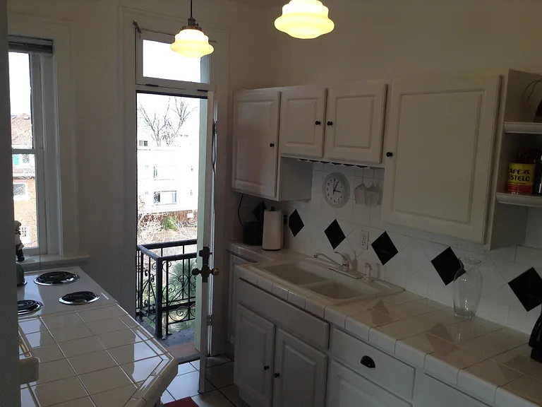Kitchen has a door to the fire escape