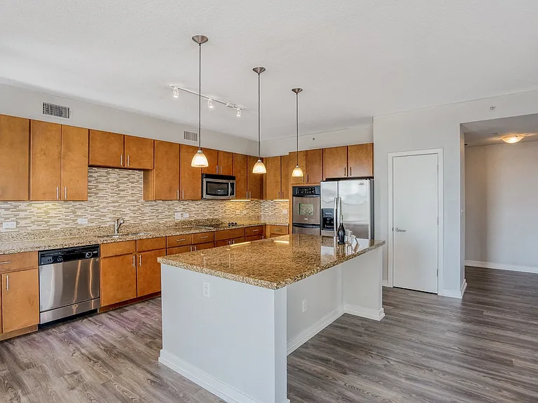 Kitchens are complete with an entertaining island and quartz countertops