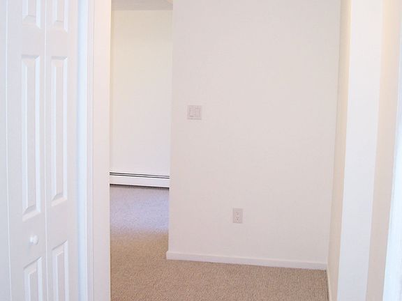 Hallway leading from bedrooms w/Hall Closet