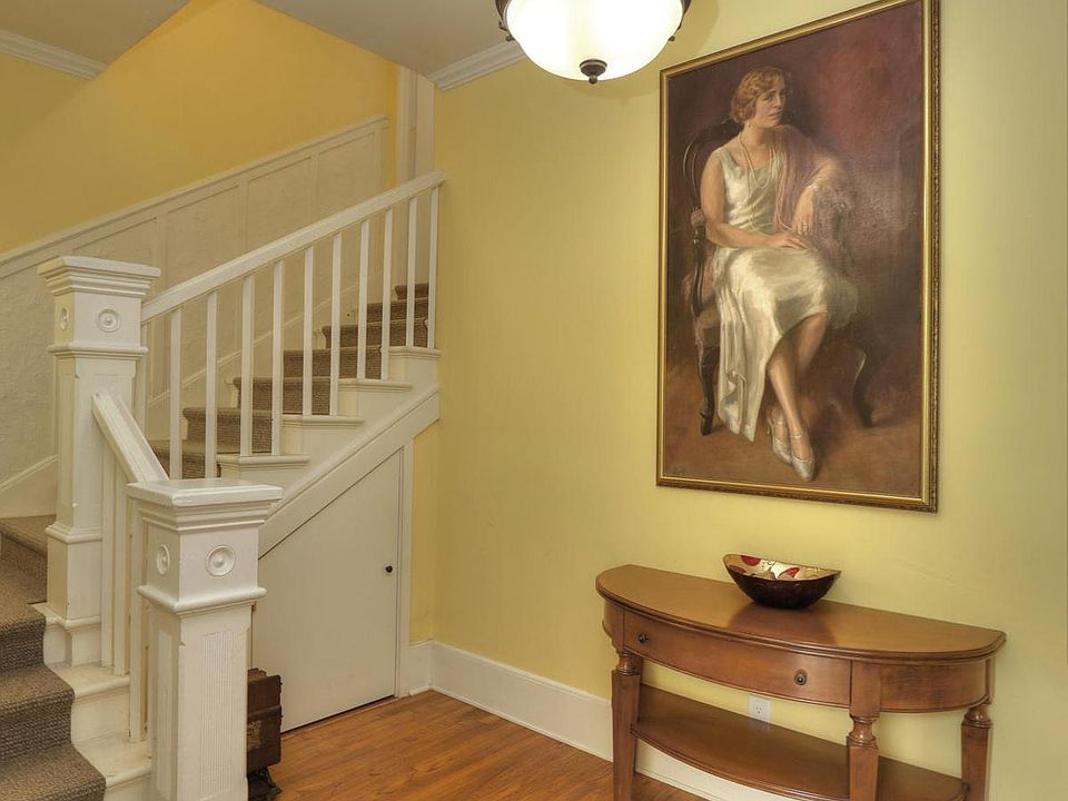Entry way to 3 bedroom. Private foyee with lots of storage under stairwell. Entry can store surf boards, bikes, and more!
