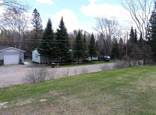 7608 Oak Dr, Republic, MI 49879