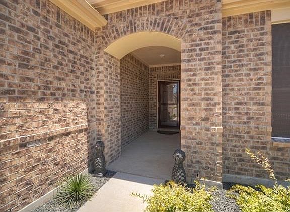 An arched entrance invites you to see more of this Sun City Texas Copper Ridge, located on a choice cul-de-sac near miles of winding walking trails.