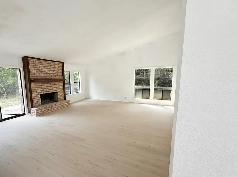 Living room with vaulted ceilings