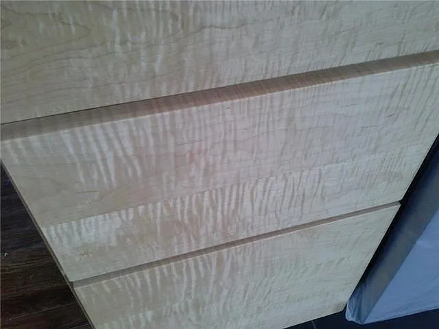 curlywood maple cabinets were custom made