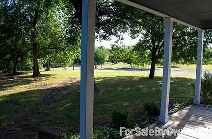 East Front Yard
						:
						Looking toward the orchard and driveway from the front porch.