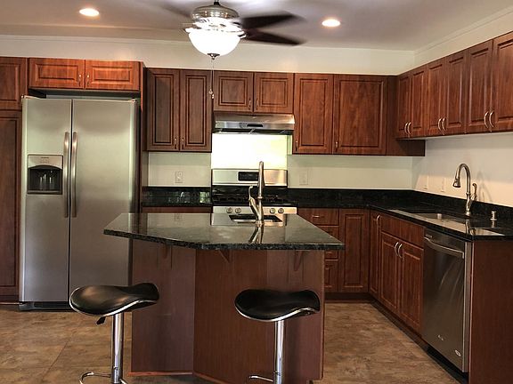 Beautiful open kitchen with stainless steel appliances