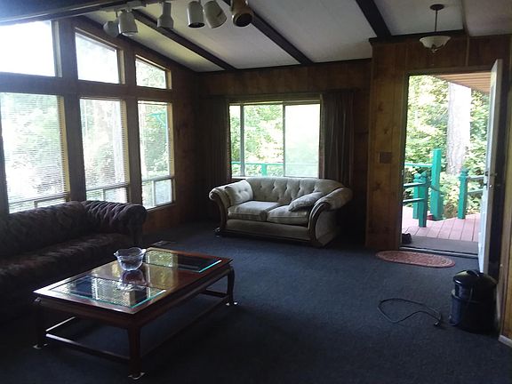 Side door view of Livingroom. Furniture not included.