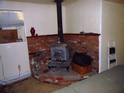 wood stove w/brick hearth