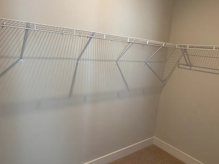 Primary Bedroom Walk-In Closet