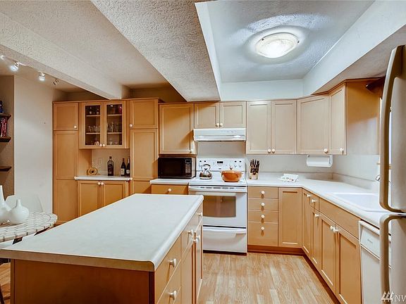 Notice the shelves in the background.  Cookbooks and appliances you don't use every day can be housed here!