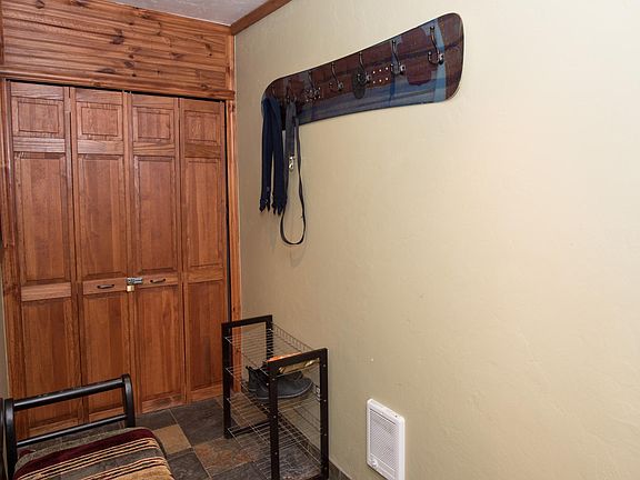 Walk into mudroom from garage and front door. Ski storage and additional heat.