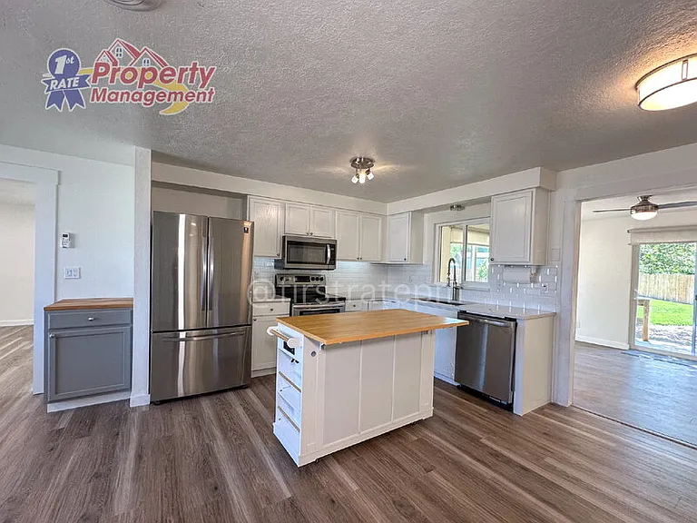 7703 S Mistyglen Ave — Photo 6