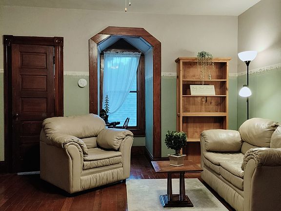 Living room that you'll walk into when you walk into the apartment.