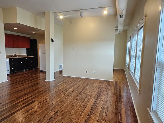 View from Living area to bedroom and kitchen.