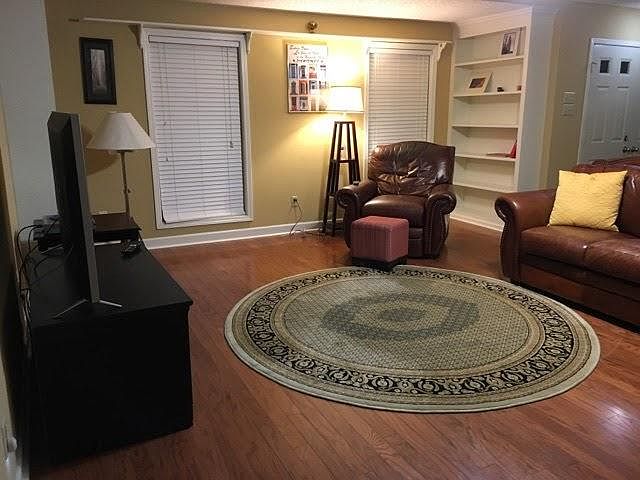 Living area with built in bookshelves