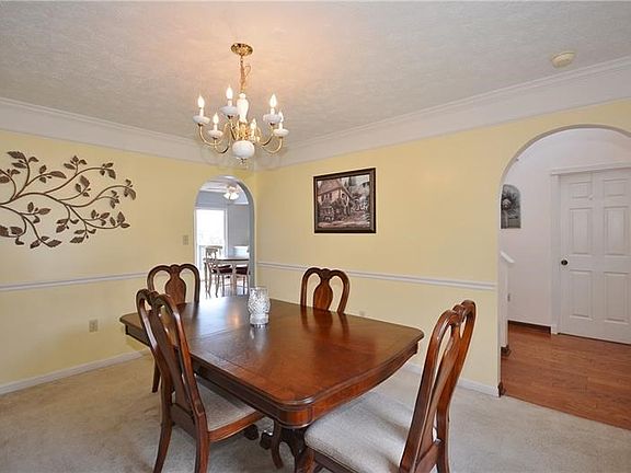 The spacious dining room can easily fit a large gathering of friends and family! Open to the foyer and kitchen, providing great 