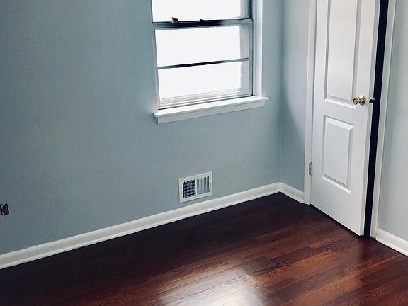 2nd bedroom with large closet, ceiling fan with light