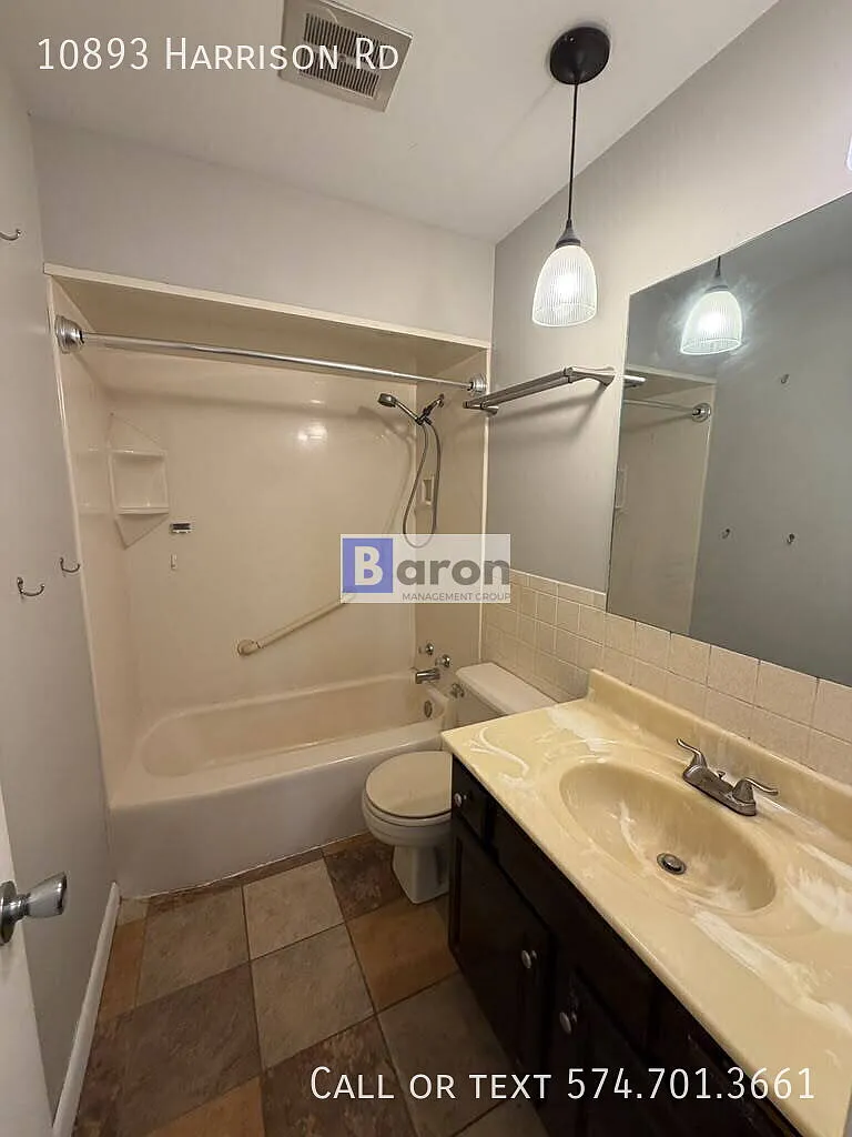 "Charming 3-Bedroom Home with Scenic Views at 10893 Harrison Rd — Photo 1