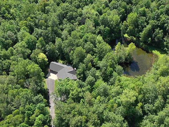 7 wooded acres/retention pond